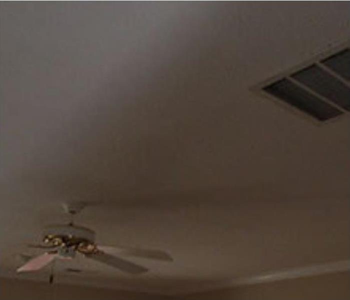 a picture of a ceiling repaired after water damage