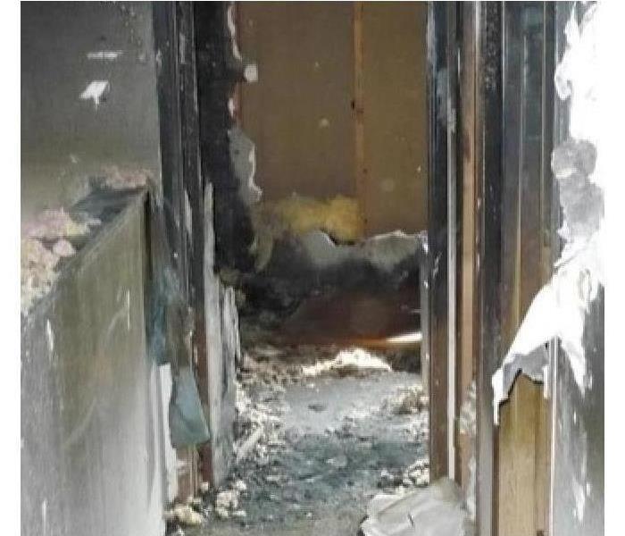 a picture of a hallway after a fire