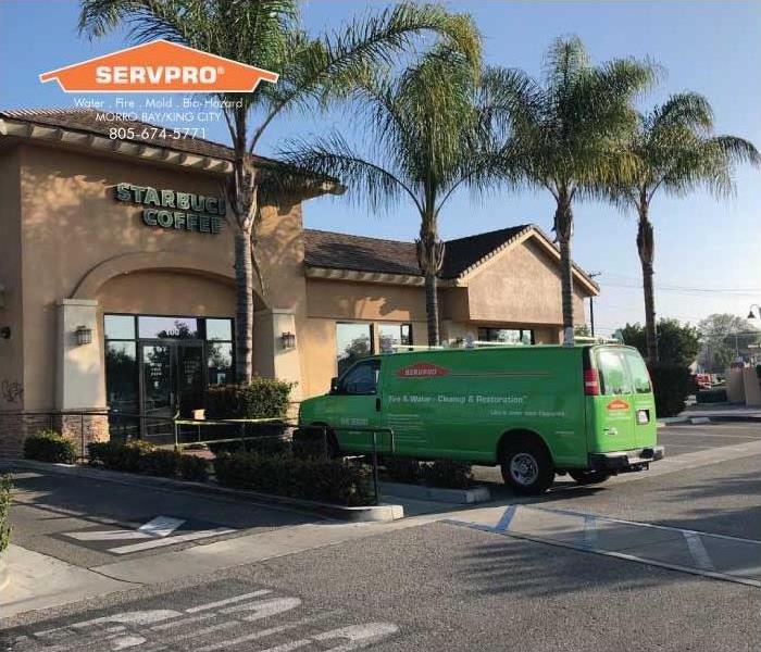 a picture of a SERVPRO van in front of Starbucks