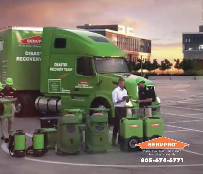 a picture of large SERVPRO trucks
