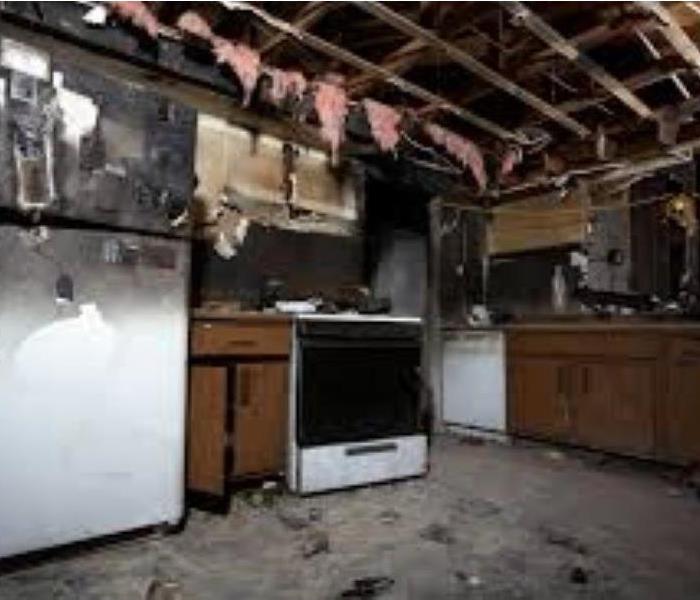 A picture of a fire-damaged kitchen